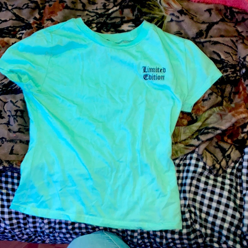 I’m selling a bluish, teal shirt